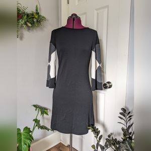 Long sleeved black dress by muse